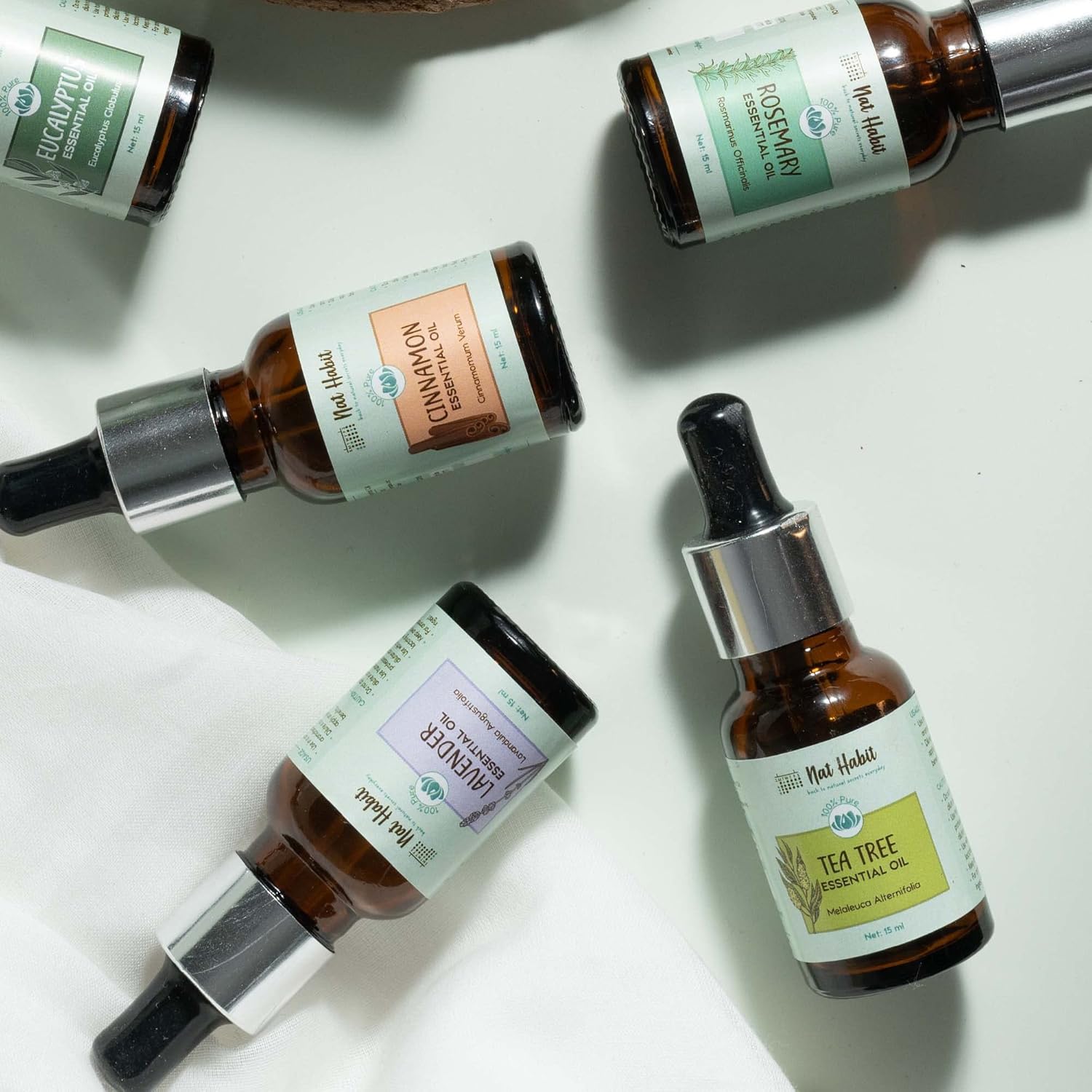 1750655765_Nat-Habit-100-Pure-Tea-Tree-Essential-Oil-With-Melaleuca-Alternifolia-For-Hair-Skin-Steam-DistilledDiffuser-Oil-Natural-Therapeutic-Grade-15-ml.jpg