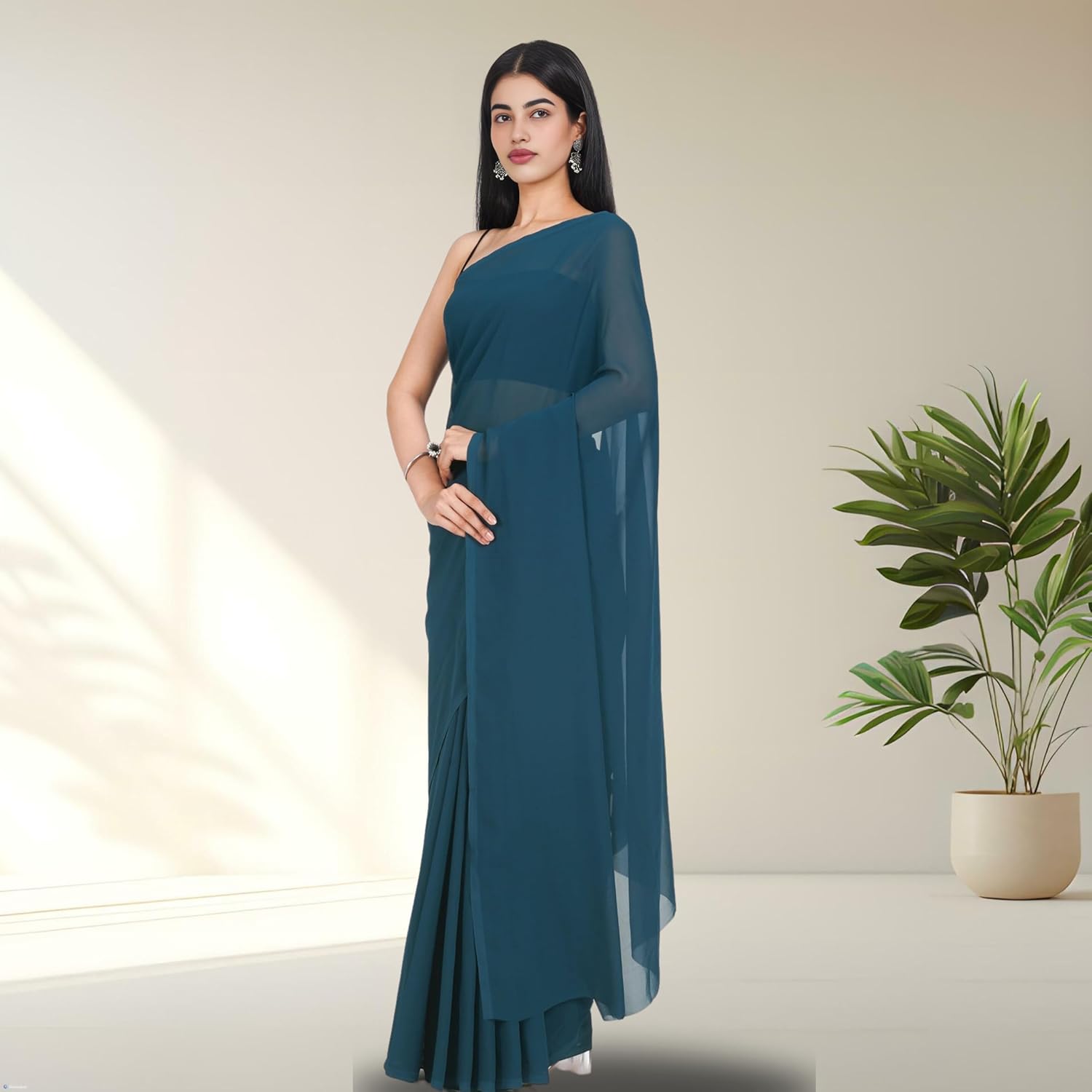 1752463907_kavipushp-Teal-Blue-Georgette-Saree-with-Unstitched-Blouse-Piece-Lightweight-Plain-Saree-for-Women-Perfect-for-regular-Wear-Office-Wear-Casual-Occasions.jpg